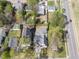 Aerial view of a neighborhood showcasing mature trees and well-maintained homes at 717 Penn Rd, Raleigh, NC 27604