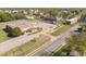 Aerial view of brick buildings with parking lots at 717 Penn Rd, Raleigh, NC 27604