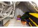 View of attic space featuring insulation, boxes and storage at 717 Penn Rd, Raleigh, NC 27604