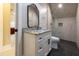 Modern bathroom featuring a glass shower and black honeycomb tile floor at 717 Penn Rd, Raleigh, NC 27604