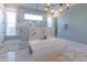 Bathroom featuring an elegant tub and spa shower with gorgeous tile and natural light at 717 Penn Rd, Raleigh, NC 27604