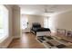 Spacious bedroom with a ceiling fan and plenty of natural light at 717 Penn Rd, Raleigh, NC 27604