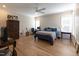 Large bedroom with a ceiling fan and plenty of space for furniture and decor at 717 Penn Rd, Raleigh, NC 27604