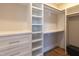 Organized walk-in closet with custom shelving and drawers for ample storage at 717 Penn Rd, Raleigh, NC 27604