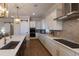 Contemporary kitchen featuring granite countertops, stainless steel appliances, and plenty of storage at 717 Penn Rd, Raleigh, NC 27604