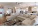 Inviting living room with a large sectional couch and stylish decor creates a comfortable and modern gathering space at 717 Penn Rd, Raleigh, NC 27604