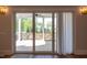 Relax with ease with access to the outdoor patio from sliding glass doors and an abundance of natural light at 717 Penn Rd, Raleigh, NC 27604