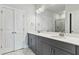 Bathroom featuring double sink vanity with modern fixtures and neutral tones at 761 Portland Rose Dr, Knightdale, NC 27545