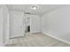 Spacious bedroom with carpet, natural light, and en-suite bathroom entrance at 761 Portland Rose Dr, Knightdale, NC 27545