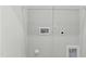 Clean utility room with shelving for storage and access to utilities at 761 Portland Rose Dr, Knightdale, NC 27545