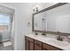 This bathroom has a double sink, a big mirror, and white marble countertop at 78 Rolling Meadows Ln, Chapel Hill, NC 27517