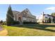 Attractive home with a manicured lawn, stone accents, and trimmed bushes creating great curb appeal at 78 Rolling Meadows Ln, Chapel Hill, NC 27517