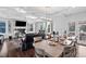 Bright open-concept area features a dining area, living room, fireplace and upscale furniture at 78 Rolling Meadows Ln, Chapel Hill, NC 27517