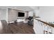 Contemporary living room with wood accent wall and leather recliners at 78 Rolling Meadows Ln, Chapel Hill, NC 27517