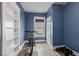 Bedroom with window, hardwood floors, weights and exercise bike, perfect for a home gym! at 908 Spruce St, Durham, NC 27701