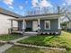 Inviting home exterior with a covered porch, offering curb appeal and charm at 908 Spruce St, Durham, NC 27701