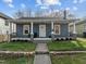 Charming single-story home with a welcoming front porch and well-manicured lawn at 908 Spruce St, Durham, NC 27701