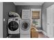 Laundry room with standard washer and dryer unit, perfect for your laundry needs at 908 Spruce St, Durham, NC 27701