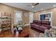 Inviting living room featuring hardwood floors and an abundance of natural light at 908 Spruce St, Durham, NC 27701