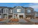 New townhouse construction showing the exterior with garage and driveway at 1171 Abbott St, Mebane, NC 27302