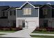 New construction featuring a townhouse with a clean design and landscaping at 1171 Abbott St, Mebane, NC 27302