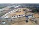 Aerial view of a new community highlighting houses and construction areas at 12 Rolling Banks Dr, Louisburg, NC 27549