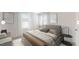 Elegant bedroom with soft lighting, large bed, and modern decor, creating a relaxing ambiance at 12 Rolling Banks Dr, Louisburg, NC 27549
