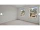 Bedroom with bright windows and a view at 12 Rolling Banks Dr, Louisburg, NC 27549