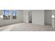 Light filled bedroom with two bright windows at 12 Rolling Banks Dr, Louisburg, NC 27549