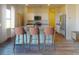Modern kitchen featuring granite countertops, stainless steel appliances, and ample cabinet space at 12 Rolling Banks Dr, Louisburg, NC 27549