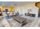Stylish living room featuring designer decor, open floor plan, and eat-in kitchen at 12 Rolling Banks Dr, Louisburg, NC 27549