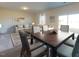 Comfortable living room and dining room combo with stylish furniture at 12 Rolling Banks Dr, Louisburg, NC 27549