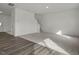 Open-concept living space with new floors, staircase, and plenty of natural light at 12 Rolling Banks Dr, Louisburg, NC 27549