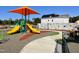 Community playground featuring slides, climbing wall and shade, perfect for Gathering fun and recreation at 123 Weavers Grove Dr, Chapel Hill, NC 27514