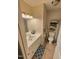 Well-lit bathroom with white vanity, a clean mirror, and functional storage at 1545 N Nc 87, Elon, NC 27244
