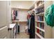 Functional closet with double hanging rods, shelves, and ample space for storage and organization at 1616 Kirkby Ln, Raleigh, NC 27614