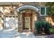 Charming stone-accented entrance with covered porch at 1616 Kirkby Ln, Raleigh, NC 27614