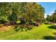 Beautiful front yard with professionally landscaped garden at 1616 Kirkby Ln, Raleigh, NC 27614