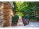 Beautiful stone pathway through lush garden at 1616 Kirkby Ln, Raleigh, NC 27614