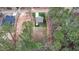 Aerial view of a cozy home nestled in a wooded area, offering privacy and natural beauty at 163 Nashua Dr, Louisburg, NC 27549