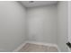 Flex space featuring gray walls, light-colored tile flooring, and white baseboards at 163 Nashua Dr, Louisburg, NC 27549