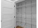 Walk-in pantry with white shelving and ample storage space, perfect for organization at 163 Nashua Dr, Louisburg, NC 27549