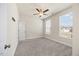 Neutral bedroom with carpet, ceiling fan and ample natural light at 212 Thunder Forest Ln, Wendell, NC 27591