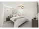 Serene bedroom with soft carpet, a ceiling fan, and decorative wall art at 212 Thunder Forest Ln, Wendell, NC 27591