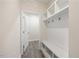 Mudroom with storage shelves and coat hooks at 212 Thunder Forest Ln, Wendell, NC 27591