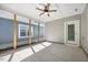 Cozy covered patio with ceiling fan, perfect for outdoor relaxation and entertaining at 212 Thunder Forest Ln, Wendell, NC 27591