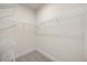 Spacious walk-in closet with shelving for ample storage and organization at 212 Thunder Forest Ln, Wendell, NC 27591