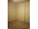 Finished basement corner with tan carpet and painted concrete walls at 2602 Fayetteville St, Durham, NC 27707