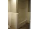 Cozy bathroom featuring a tub with white tile surround and modern flooring at 2602 Fayetteville St, Durham, NC 27707