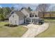Charming home with inviting front porch, two-car garage, and landscaped front yard with circular driveway at 288 Joseph Alexander Dr, Fuquay Varina, NC 27526
